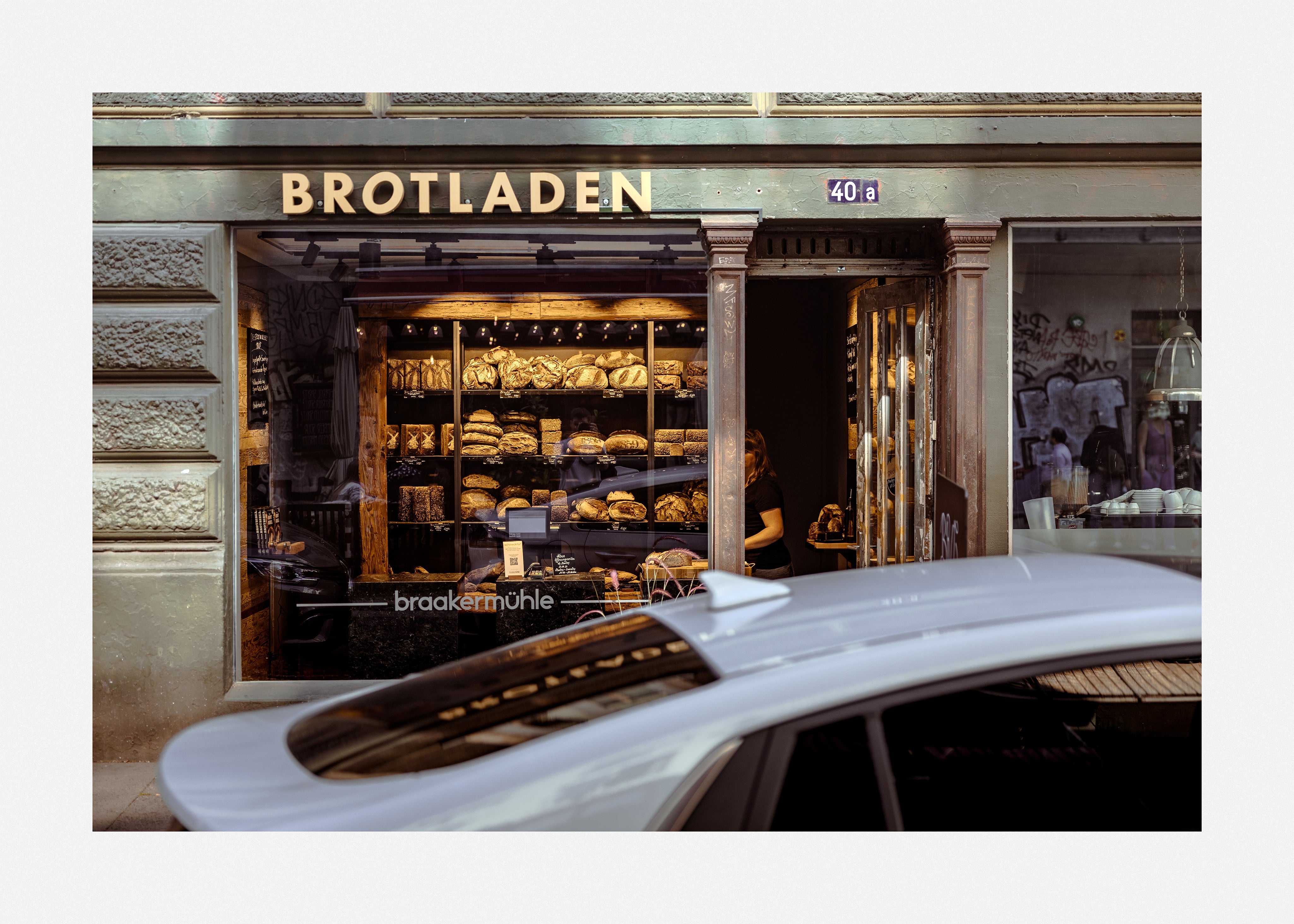 Explore unique street art featuring german bakery with this unique art print.