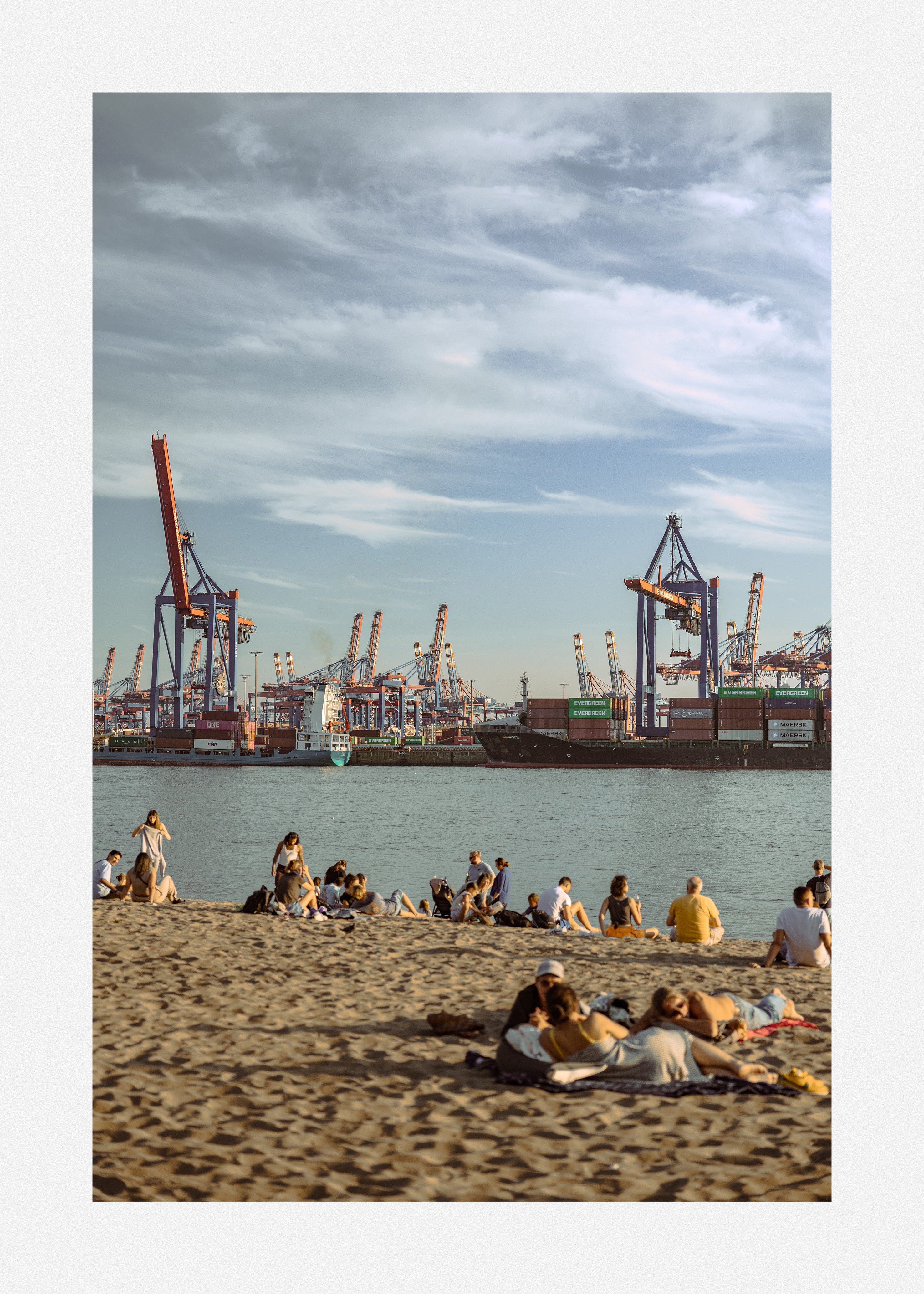 Peaceful art print of a beach with a harbor view, ideal for creating a calming atmosphere.